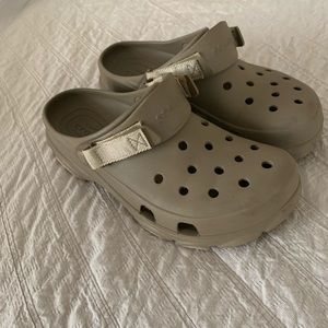 Men’s tan, all terrain crocs,  size 10